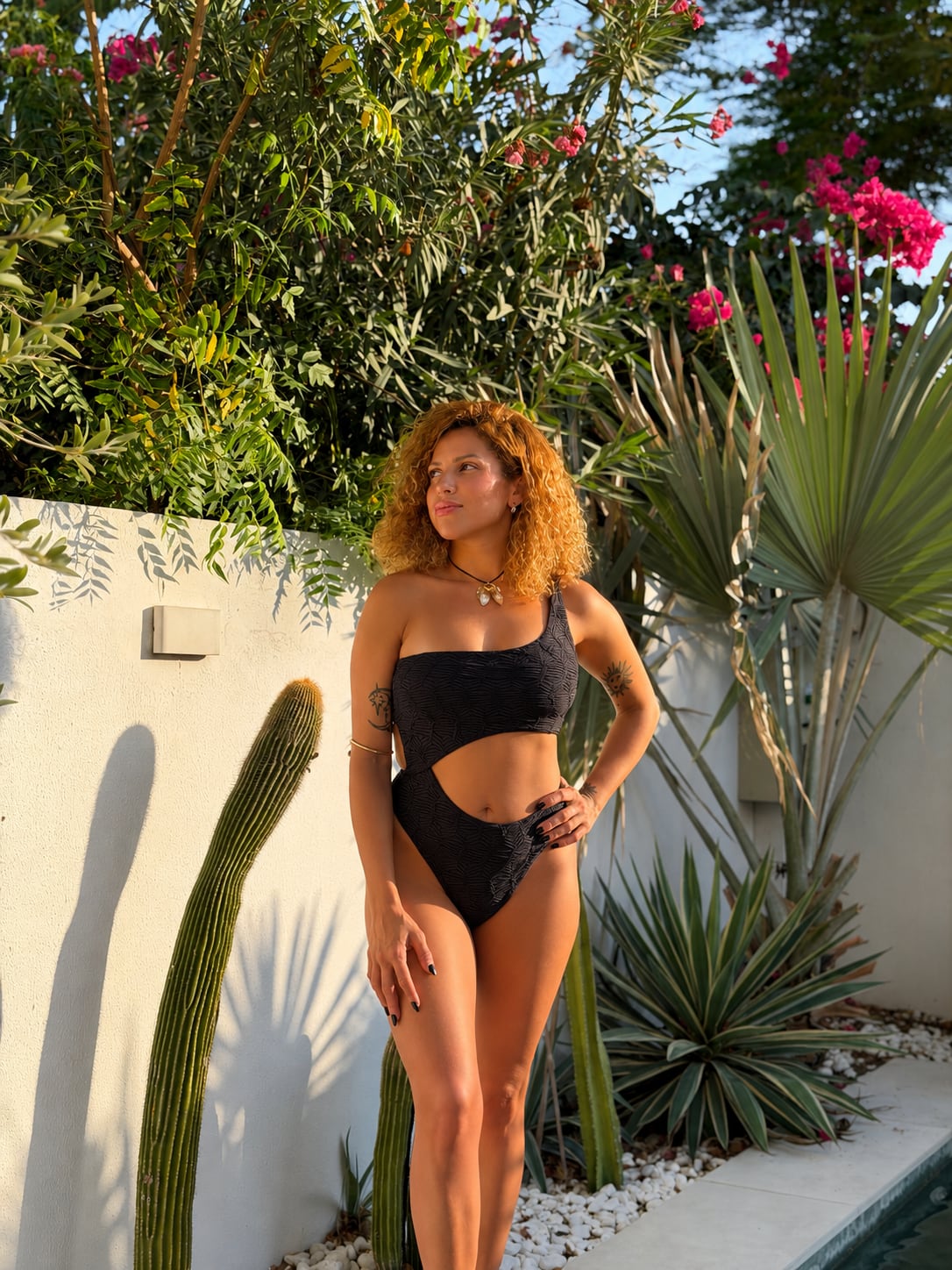 Model wearing the Éclat one-piece from the St. Tropez collection