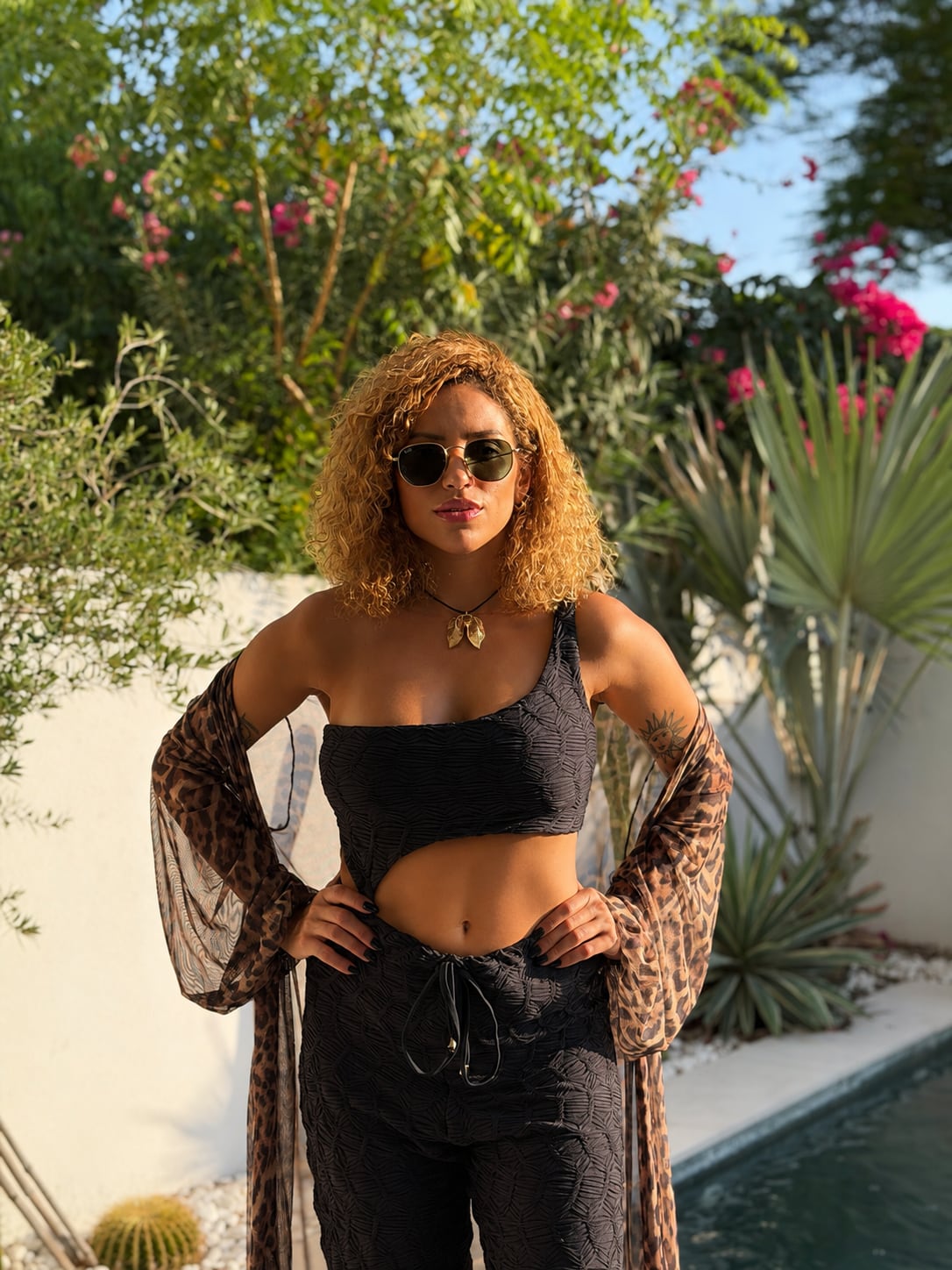 Model wearing the Éclat one-piece from the St. Tropez collection