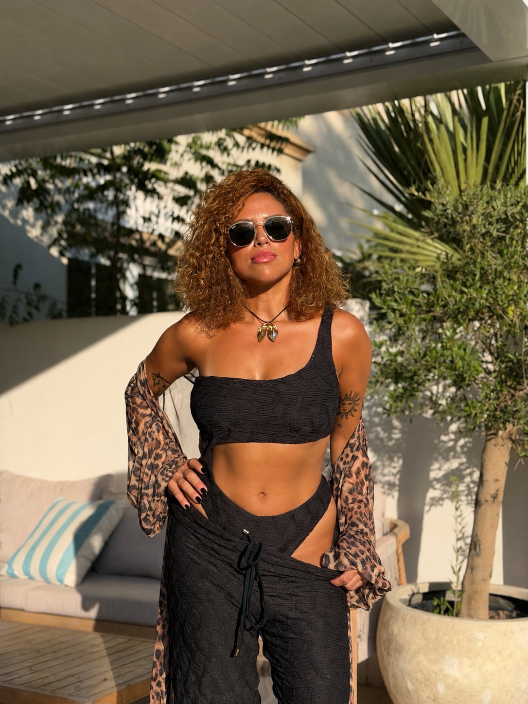 Model wearing the Éclat one-piece from the St. Tropez collection