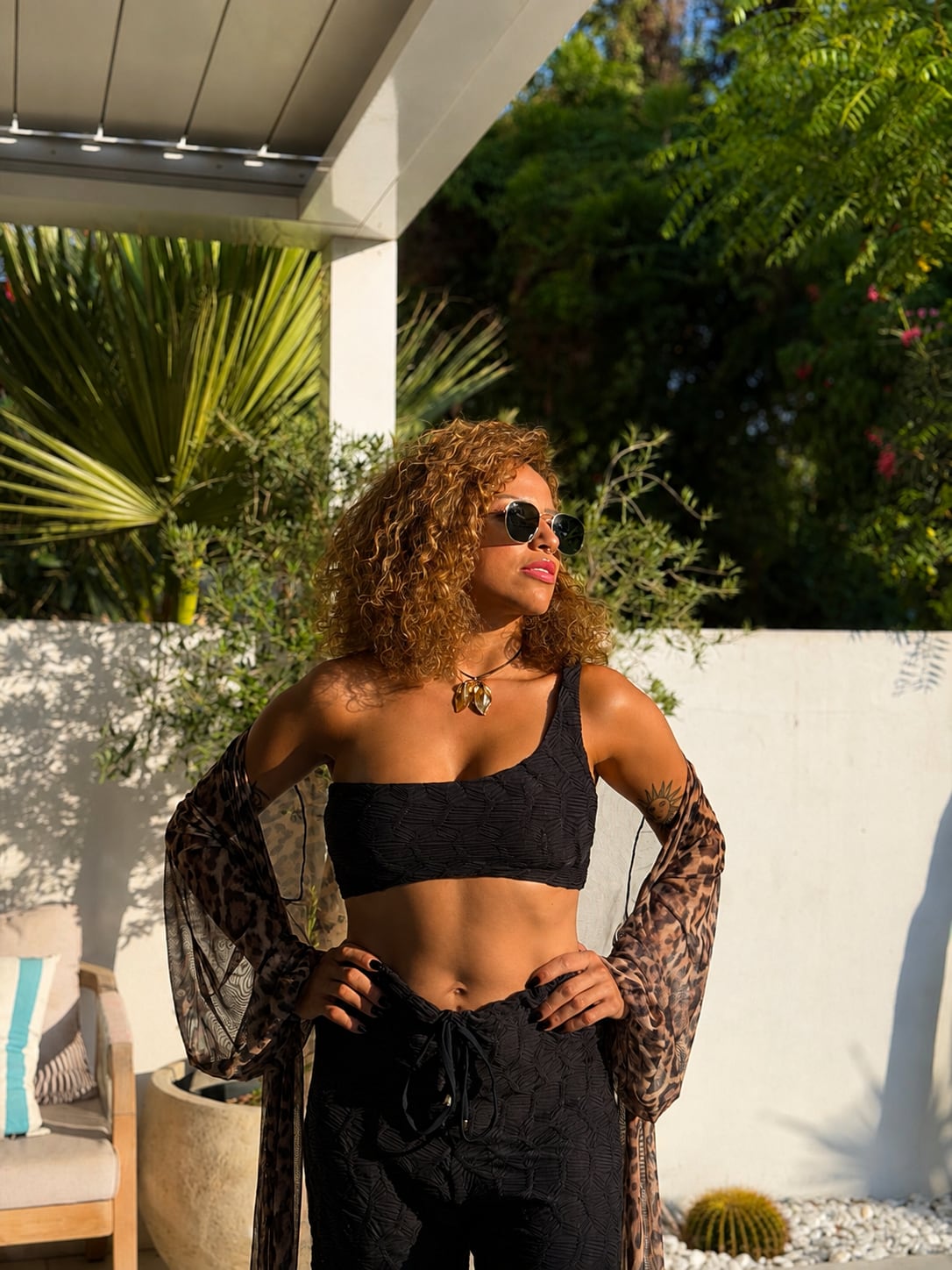 Model wearing the Éclat one-piece from the St. Tropez collection
